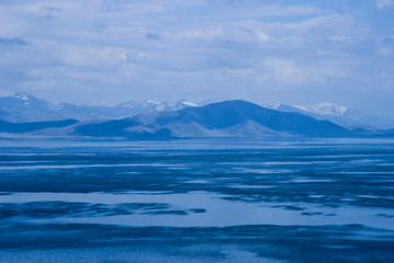 Lake Sevan is the largest body of water in Armenia and in the Caucasus region. Blue expanses of water and mountains. Natural Ecological Background