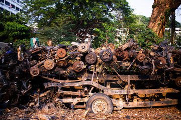 Parts of used cars sitting in junkyard
