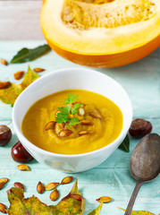 pumpkin soup on wooden surface