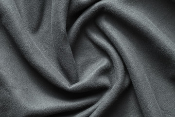 Background texture of dark gray fleece