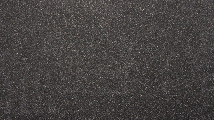 Black sandpaper texture.