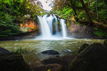 Obraz premium Landscape of peaceful waterfall in the tropical rainforest
