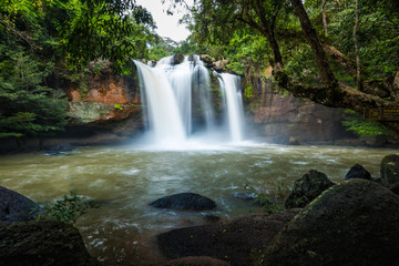 Fototapeta na wymiar Landscape of peaceful waterfall in the tropical rainforest