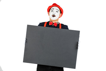 happy artist MIM is holding a black Board on a white background