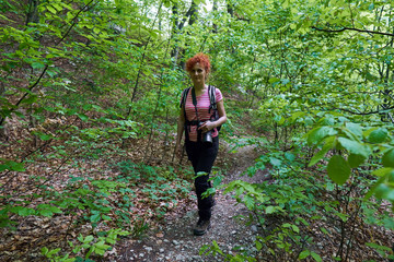 Woman hiking in the forest