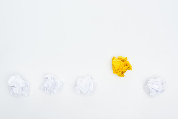 top view of crumpled paper balls Isolated On White with copy space, solution concept