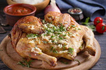 Grilled spatchcock chicken with garlic