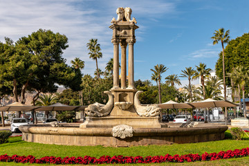 Fototapeta na wymiar Landmark Fish fountain in downtown Almeria, Spain.