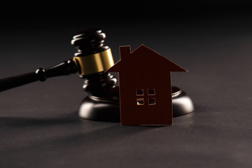 Close up view of gavel and house