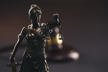 Judje gavel and statue of Justice isolated