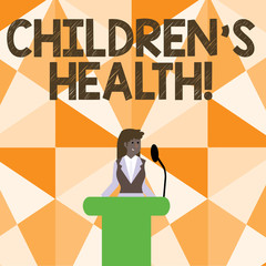 Word writing text Children S Is Health. Business photo showcasing kid condition of being free from illness or disease Businesswoman Standing Behind Podium Rostrum Speaking on Wireless Microphone