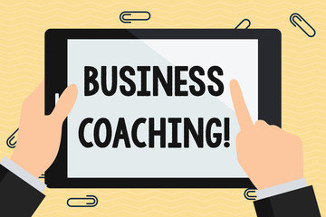 Conceptual hand writing showing Business Coaching. Concept meaning providing support and occasional advice to an individual Hand Holding Pointing Touching Color Tablet White Screen