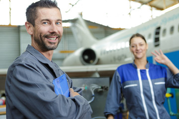 jet engineers in hangar