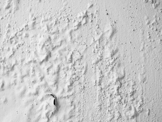 peeling of color on white wall texture