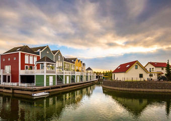 Fototapeta premium Dutch, modern, colorful vinex architecture style houses at waterside