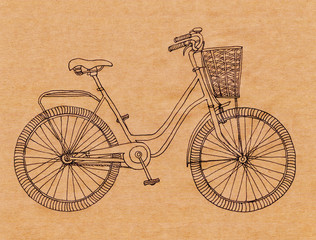 Hand drawn sketch illustration of bicycle. Vintage bike whith basket on brown paper