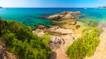 Cala Treumal beach in Lloret de Mar, Spain. Beautiful summer beach in Costa Brava resort