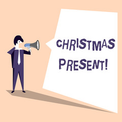 Handwriting text Christmas Present. Conceptual photo presented as a gift given in celebration of Christmas Businessman Shouting on Megaphone and Blank White Uneven Shape Speech Bubble