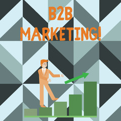 Writing note showing B2B Marketing. Business concept for marketing of products to businesses or other organizations Smiling Businessman Climbing Bar Chart Following an Arrow Up