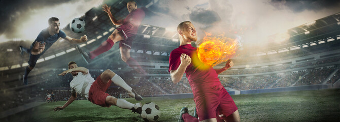Close up soccer ball in fire on dark background in front of football players of red and blue team...