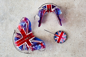 Removable orthodontic appliance, orthodontic plate with a special key, which is used to activate...