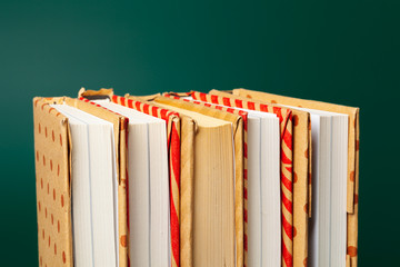 books isolated on green background