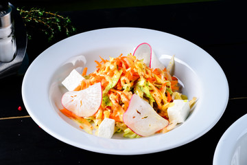 Fresh vegetable salad on table close up