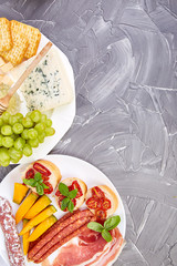 Italian antipasti wine snacks set. Antipasto with jerky, salami,