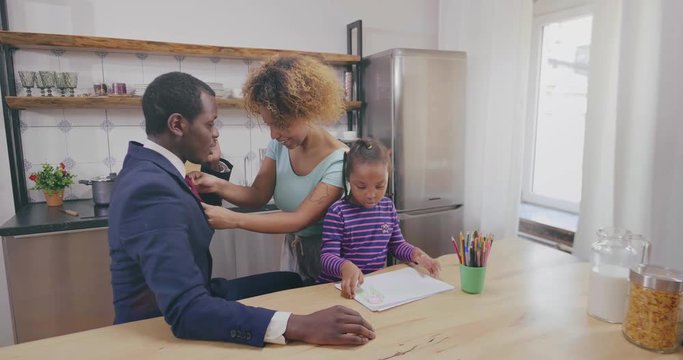 Happy Afro American family in kitchen