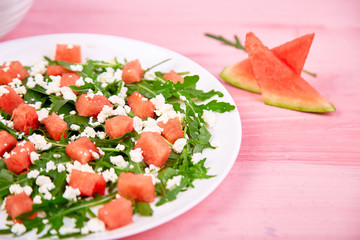 Fresh summer watermelon salad with feta cheese and arugula