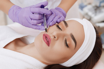 Procedure filler injection in beauty clinic.