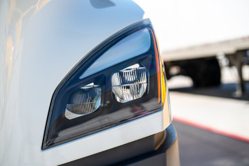 Semi truck 18 wheeler modern headlamp closeup headlight