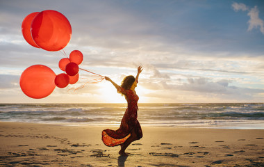 Woman enjoying a summer day on beach