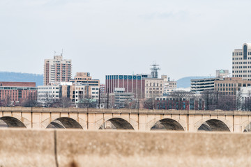 Naklejka premium Cityscape skyline in Harrisburg, Pennsylvania USA capital city view from highway road on cloudy day