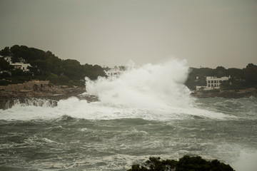 Waves crashing on rocks