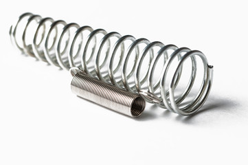 Metal spring isolated on white background