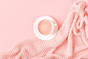 Background with pink plaid and coffee.