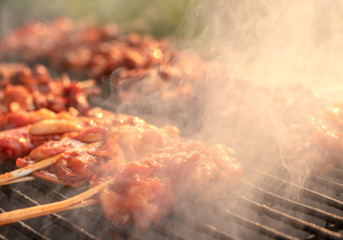 Grilled chicken with smoke.