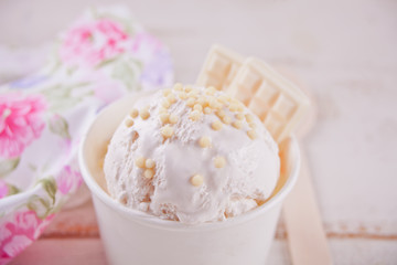 Vanilla ice cream with white chocolate on the white background.