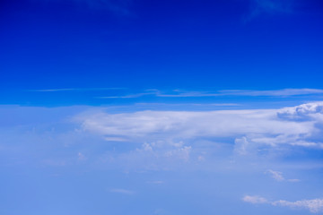 Airplane wing blue sky background
