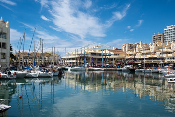 Fototapeta na wymiar BENALMADENA, MALAGA, SPAIN. May 8, 2019. Port Marina with boats docked