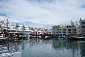 Fototapeta na wymiar BENALMADENA, MALAGA, SPAIN. May 8, 2019. Port Marina with boats docked