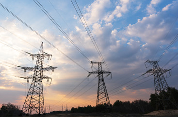 High-voltage power lines. Electricity distribution station. high voltage electric transmission...