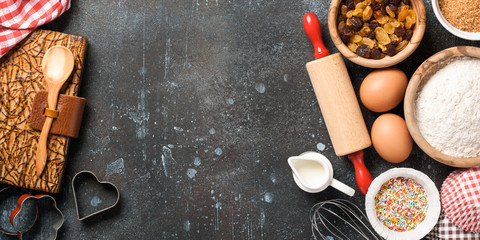 Baking table with ingredients and cookbook
