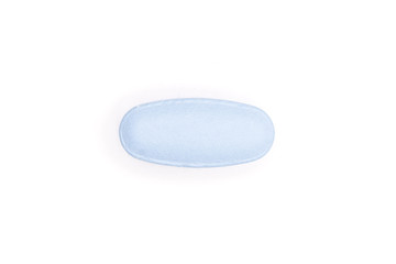 One whole blue medical drug flatlay isolated on white background