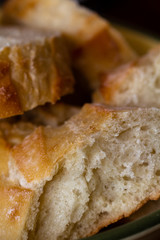 Fresh baked bread cut up and put in a bowl for dinner