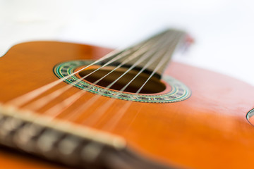Fototapeta premium Classic acoustic guitar on white background view.