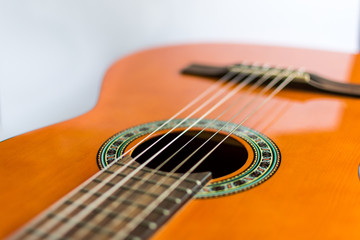 Fototapeta premium Classic acoustic guitar on white background view.