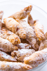 Cornulețe. A traditional Romania dessert that is a small croissant stuffed with jam or Turkish delight sprinkled with icing sugar