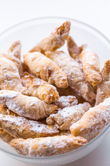 Cornulețe. A traditional Romania dessert that is a small croissant stuffed with jam or Turkish delight sprinkled with icing sugar